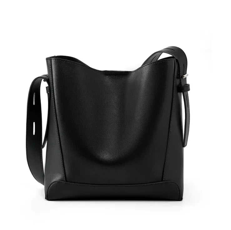 Black leather handbag on a white background
